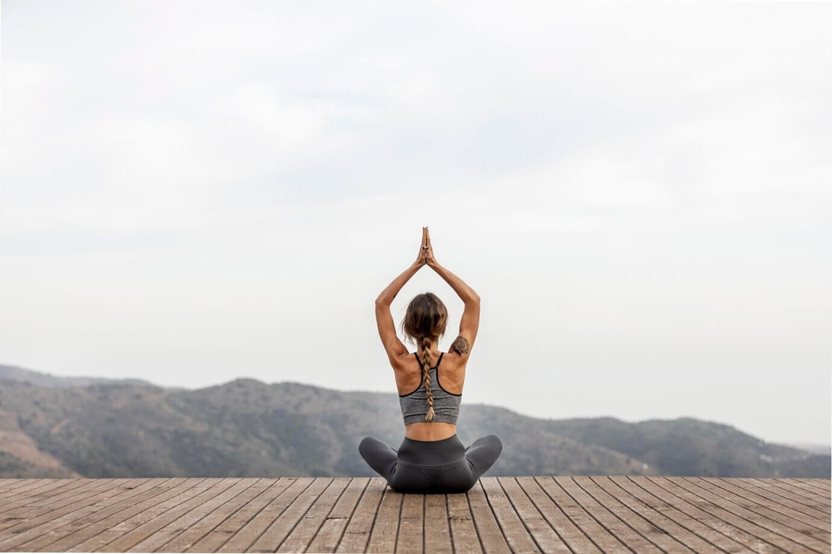 Woman Sat Doing Yoga